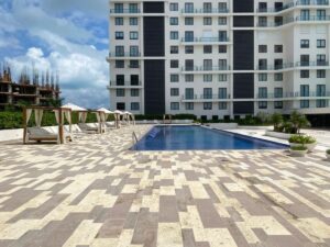 Departamento frente a marina en Puerto Cancún con albercas y espacios al aire libre frente al mar Caribe