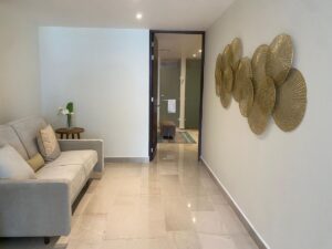 Exclusivo departamento residencial en Puerto Cancún con acceso a marina y spa