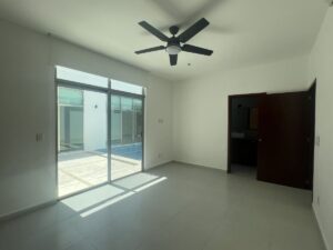 Jardín privado en casa en Villa Magna Cancún con alberca central y ambiente residencial premium