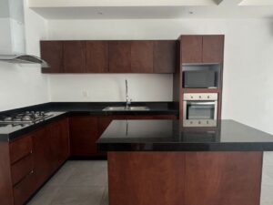 Propiedad en Aqua Residencial Cancún con diseño moderno y cocina abierta