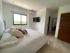 Departamento de 2 recámaras en Cipres Residencial en Huayacán Cancún con acabados de calidad y diseño moderno
