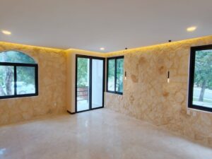Propiedad residencial de lujo en Tulum Country Club con arquitectura moderna y elegante